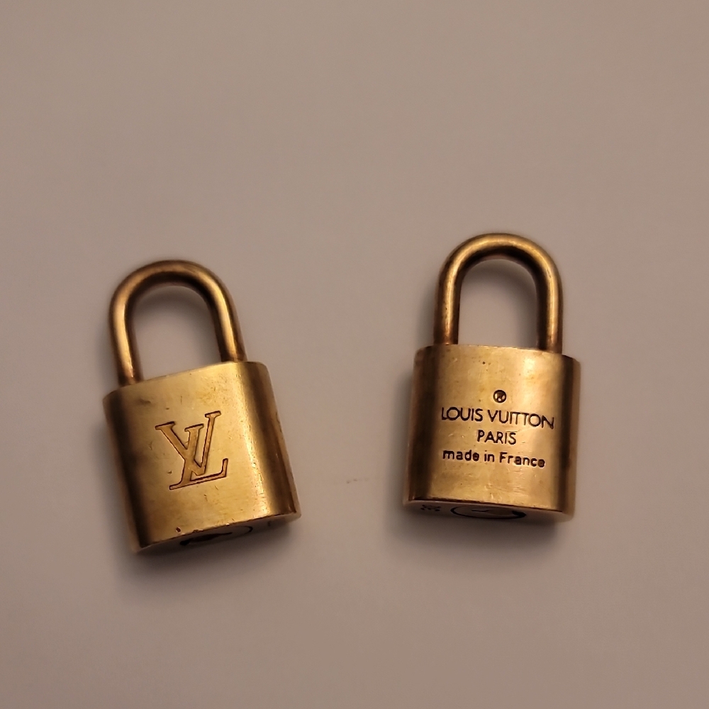 Two Louis Vuitton Luxurious Gold Locks *free gift w/purchase*